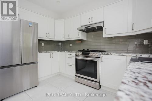 47 - 3020 Cedarglen Gate, Mississauga (Erindale), ON - Indoor Photo Showing Kitchen With Upgraded Kitchen