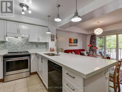 49 - 3250 Bentley Drive, Mississauga (Churchill Meadows), ON - Indoor Photo Showing Kitchen With Double Sink With Upgraded Kitchen