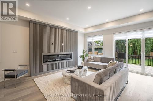 1076 Roosevelt Road, Mississauga, ON - Indoor Photo Showing Living Room With Fireplace