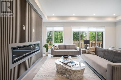 1076 Roosevelt Road, Mississauga (Lakeview), ON - Indoor Photo Showing Living Room With Fireplace