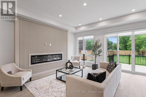 1080 Roosevelt Road, Mississauga (Lakeview), ON - Indoor Photo Showing Living Room With Fireplace