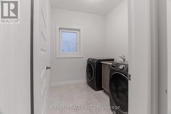 Massive laundry machines and sink on main level - 