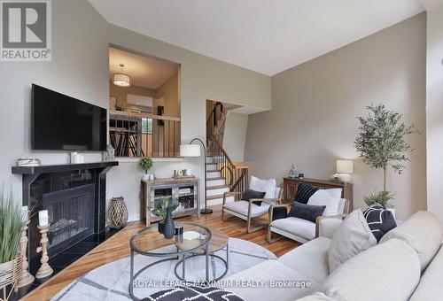 52 - 4165 Fieldgate Drive, Mississauga (Rathwood), ON - Indoor Photo Showing Living Room With Fireplace