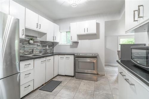 15 Agnes Street, Hamilton, ON - Indoor Photo Showing Kitchen With Double Sink