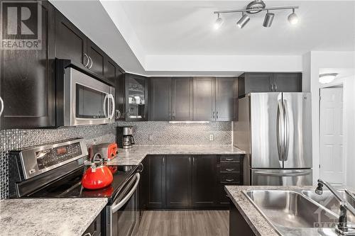 38 Barnstone Drive Unit#4, Ottawa, ON - Indoor Photo Showing Kitchen With Stainless Steel Kitchen With Double Sink With Upgraded Kitchen