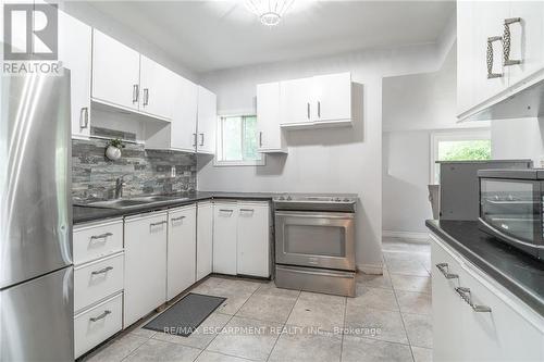 15 Agnes Street, Hamilton (Crown Point), ON - Indoor Photo Showing Kitchen With Double Sink