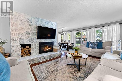 601 Glenwood Drive, Pembroke, ON - Indoor Photo Showing Living Room With Fireplace