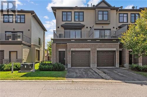 57 Mersey Drive, Kanata (9008 - Kanata - Morgan'S Grant/South March), ON - Outdoor With Balcony With Facade