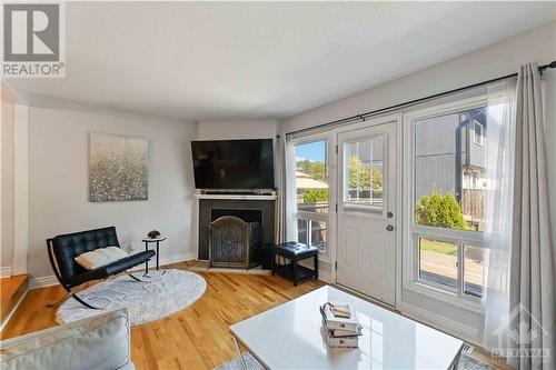 7E Vanessa Terrace, Ottawa, ON - Indoor Photo Showing Living Room With Fireplace