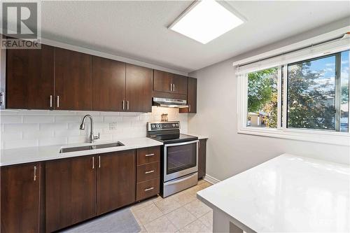 7E Vanessa Terrace, Ottawa, ON - Indoor Photo Showing Kitchen With Double Sink