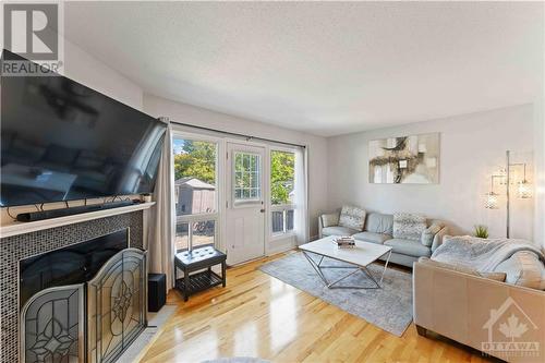 7E Vanessa Terrace, Ottawa, ON - Indoor Photo Showing Living Room With Fireplace