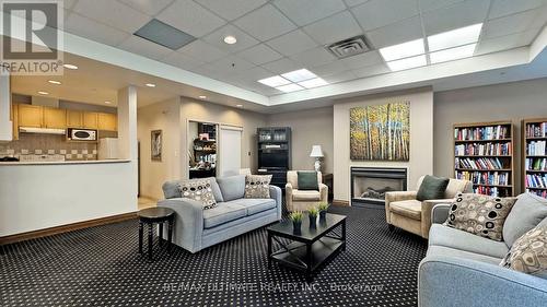 206 - 645 Millwood Road, Toronto (Mount Pleasant East), ON - Indoor Photo Showing Living Room With Fireplace