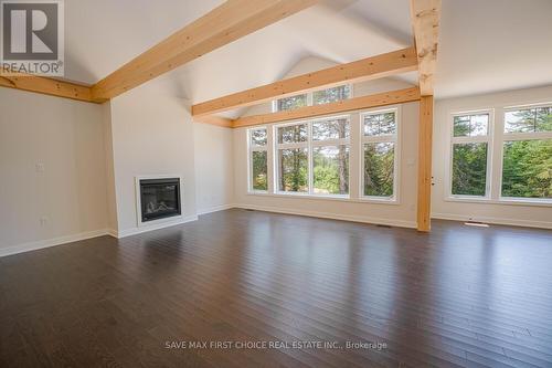 1005 Kingsridge Court, Huntsville, ON - Indoor Photo Showing Living Room With Fireplace