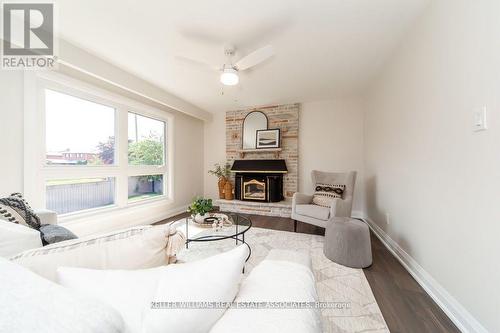 4281 Creeks End, Mississauga, ON - Indoor Photo Showing Living Room With Fireplace