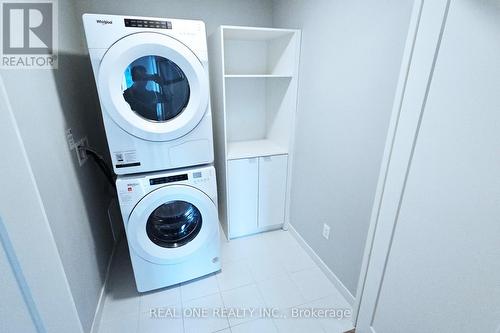 601 - 10 Eva Road, Toronto (Etobicoke West Mall), ON - Indoor Photo Showing Laundry Room