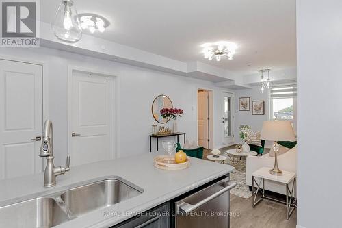 602 - 58 Adam Sellers Street, Markham (Cornell), ON - Indoor Photo Showing Kitchen With Double Sink