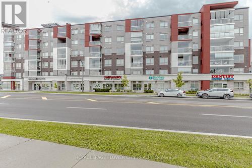 602 - 58 Adam Sellers Street, Markham, ON - Outdoor With Balcony With Facade