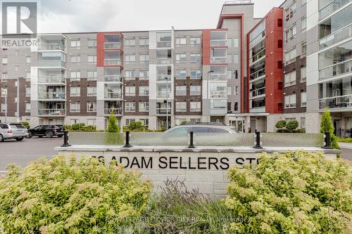 602 - 58 Adam Sellers Street, Markham, ON - Outdoor With Balcony With Facade