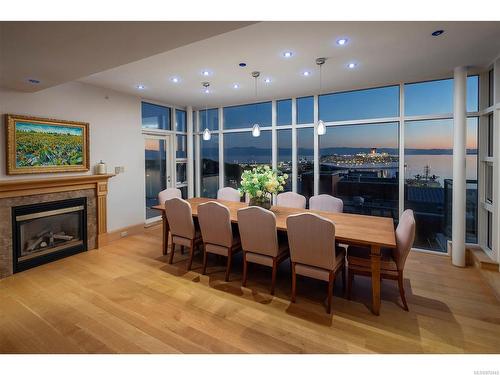 1201-21 Dallas Rd, Victoria, BC - Indoor Photo Showing Dining Room With Fireplace