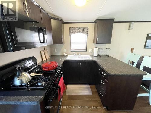 486 Cty Rd 18-41 Park Meadow Lane, Prince Edward County (Athol), ON - Indoor Photo Showing Kitchen