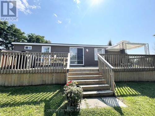 486 Cty Rd 18-41 Park Meadow Lane, Prince Edward County (Athol), ON - Outdoor With Deck Patio Veranda