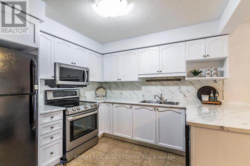 310 Fallowfield Drive, Kitchener, ON - Indoor Photo Showing Kitchen With Double Sink