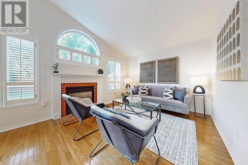 14 Southwell Avenue, Whitby (Williamsburg), ON - Indoor Photo Showing Living Room With Fireplace