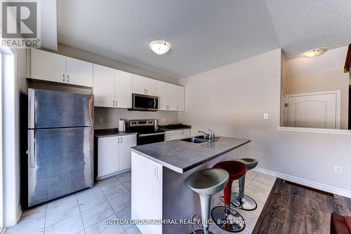 23 Bobolink Drive, Wasaga Beach, ON - Indoor Photo Showing Kitchen With Double Sink