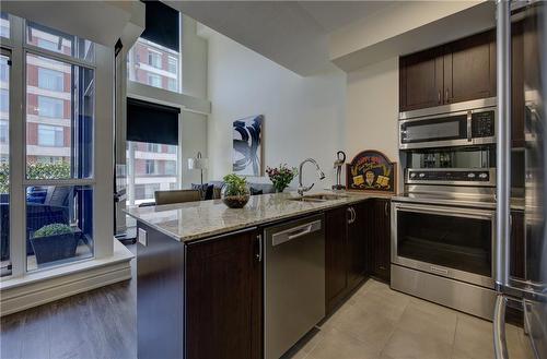 1940 Ironstone Drive|Unit #304, Burlington, ON - Indoor Photo Showing Kitchen With Double Sink