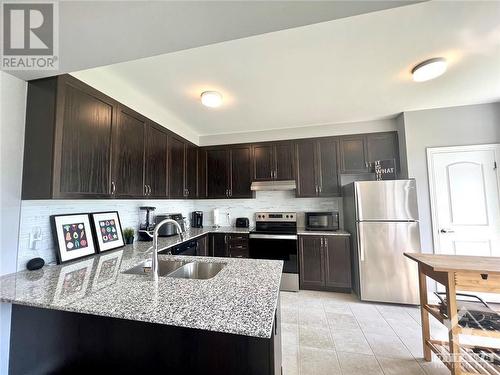 424 Cope Drive, Ottawa, ON - Indoor Photo Showing Kitchen With Stainless Steel Kitchen With Double Sink With Upgraded Kitchen