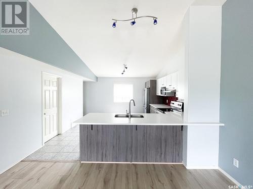 3 3472 Fairlight Drive, Saskatoon, SK - Indoor Photo Showing Kitchen With Double Sink