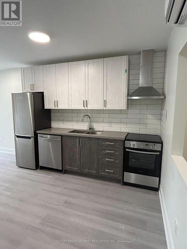 1 - 513 Ossington Avenue, Toronto, ON - Indoor Photo Showing Kitchen With Stainless Steel Kitchen With Double Sink