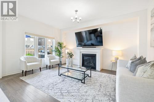 14 Lyle Drive, Clarington, ON - Indoor Photo Showing Living Room With Fireplace