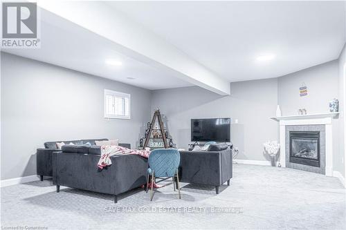 16 Dowden Avenue, Brantford, ON - Indoor Photo Showing Other Room With Fireplace