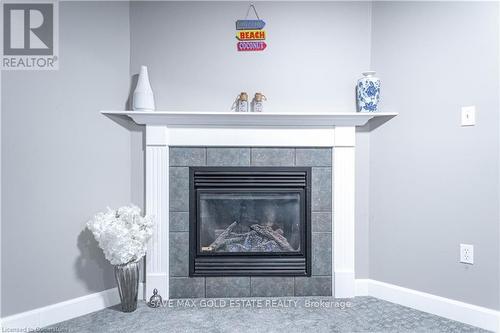 16 Dowden Avenue, Brantford, ON - Indoor Photo Showing Living Room With Fireplace