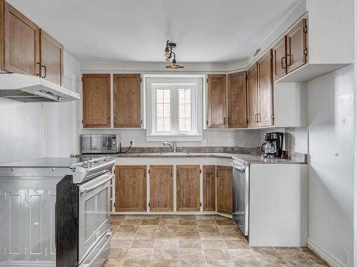 Kitchen - 50  - 56 Rue St-Jean-Baptiste E., Montmagny, QC - Indoor Photo Showing Kitchen With Double Sink