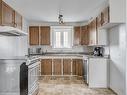 Kitchen - 50  - 56 Rue St-Jean-Baptiste E., Montmagny, QC  - Indoor Photo Showing Kitchen With Double Sink 