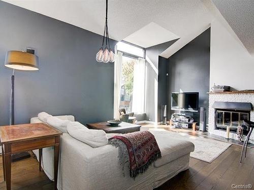 Living room - 43Z Rue Gabrielle-Roy, Montréal (Verdun/Île-Des-Soeurs), QC - Indoor Photo Showing Other Room With Fireplace