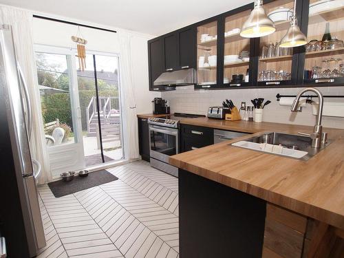 Cuisine - 11 Rue Des Sittelles, Saint-Charles-Borromée, QC - Indoor Photo Showing Kitchen With Double Sink