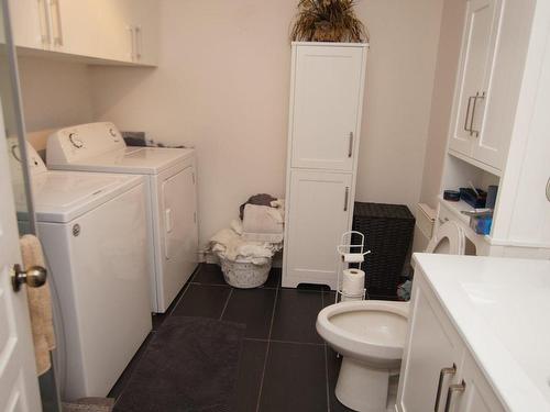 Bathroom - 11 Rue Des Sittelles, Saint-Charles-Borromée, QC - Indoor Photo Showing Laundry Room