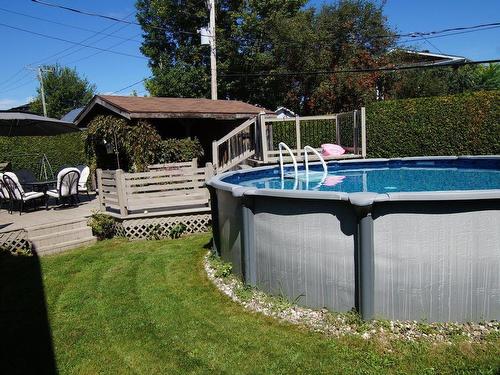 Cour - 11 Rue Des Sittelles, Saint-Charles-Borromée, QC - Outdoor With Above Ground Pool With Backyard