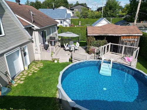 Cour - 11 Rue Des Sittelles, Saint-Charles-Borromée, QC - Outdoor With Above Ground Pool With Backyard