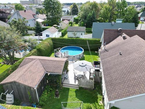 Backyard - 11 Rue Des Sittelles, Saint-Charles-Borromée, QC - Outdoor With Above Ground Pool