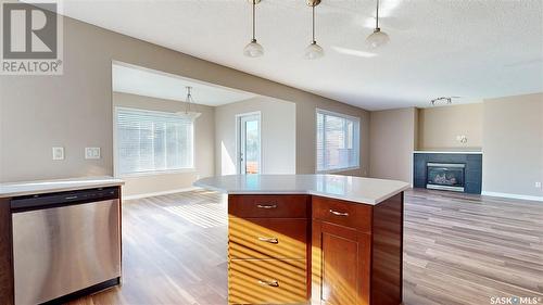 1007 Gull Road, Regina, SK - Indoor Photo Showing Kitchen With Fireplace