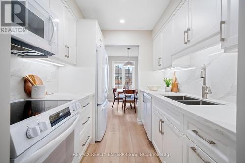 207 - 2055 Walkers Line, Burlington, ON - Indoor Photo Showing Kitchen With Double Sink With Upgraded Kitchen