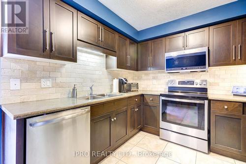 52 - 105 Bard Boulevard, Guelph, ON - Indoor Photo Showing Kitchen With Stainless Steel Kitchen With Double Sink