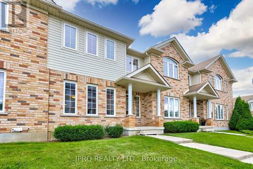 52 - 105 Bard Boulevard, Guelph, ON - Outdoor With Facade