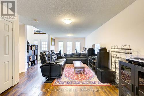 52 - 105 Bard Boulevard, Guelph (Pine Ridge), ON - Indoor Photo Showing Living Room With Fireplace