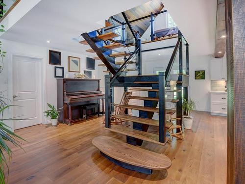 Staircase - 2647 Ch. Mcgill, Sainte-Julienne, QC - Indoor Photo Showing Other Room With Fireplace