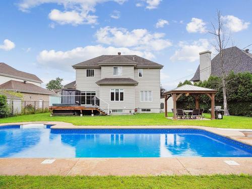 Face arriÃ¨re - 243 Rue Du Bosquet, Pincourt, QC - Outdoor With In Ground Pool With Deck Patio Veranda With Backyard